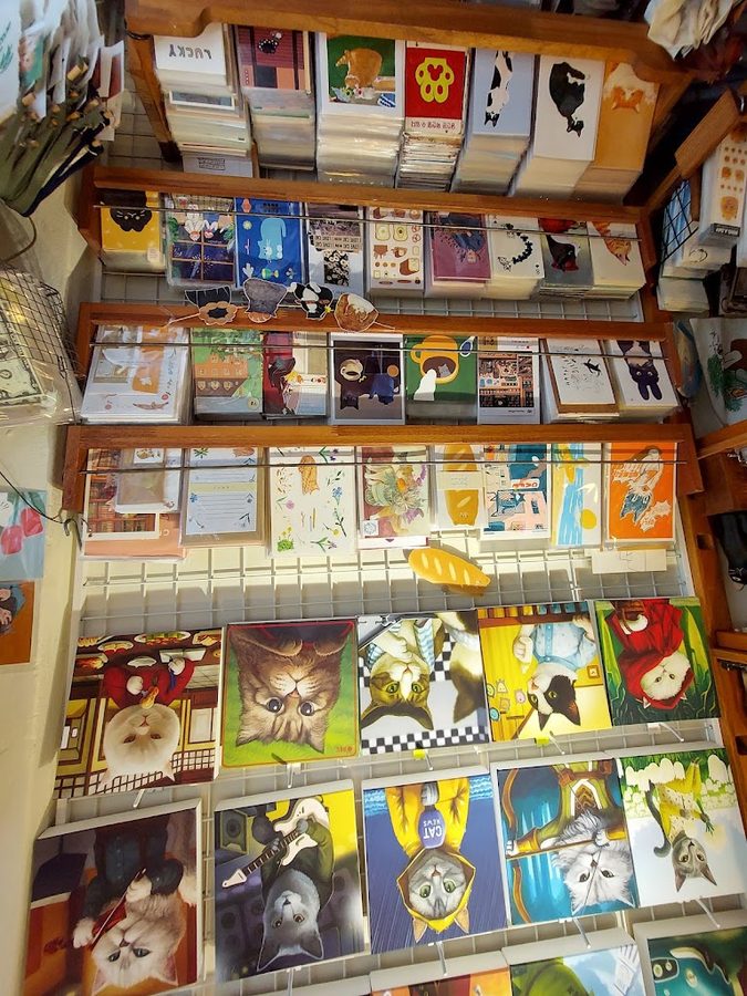 有貓的畫框店